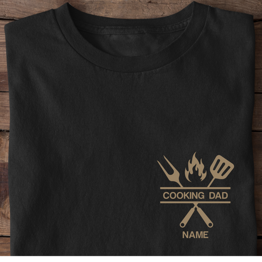 The COOKING DAD, Name personalisierbar, Unisex Shirt, - Premium Shirt